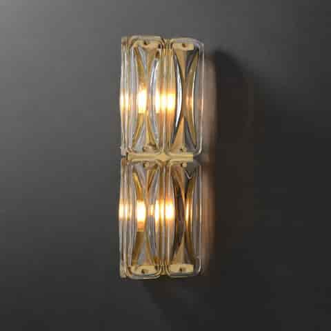 Double tier geometric clear glass wall sconce with warm brass accents